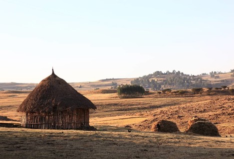 Landscape with round hut in the district of Europia, Ethiopia, Africa