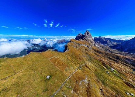 The Sas Rigais and Furchetta peaks of the Odle Group, drone shot, Val Gardena, Dolomites,