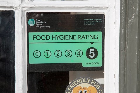 Food Standards Agency hygiene rating sign notice awarding five stars, Suffolk, England, Uk