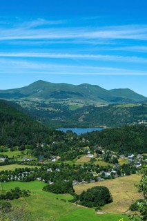Panoramic view of Lake Chambon and the Sancy massif in the Auvergne Volcanoes Regional Natural