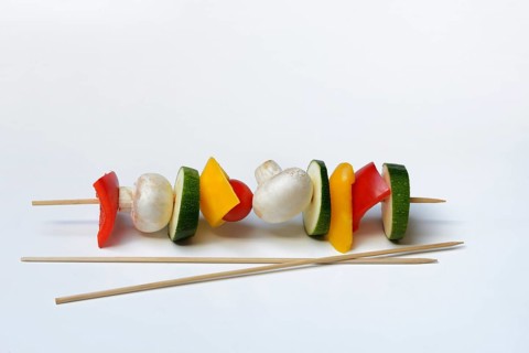 Colourful vegetable skewers and barbecue skewers