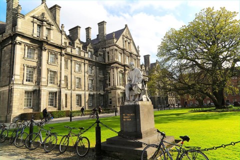 Graduates Memorial building and George Salmon statue, Trinity College university, city of Dublin,