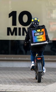 Bicycle courier from the fast delivery service Gorillas, delivers groceries, currently in over 20