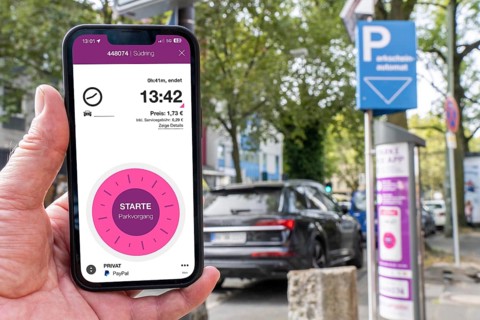 Parking in public spaces via parking app, EasyPark, here in Bochum, parking ticket machine where