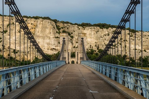 Old suspension bridge over the Rhone and rocks, Passerelle Marc Seguin, Tain-l'Hermitage,