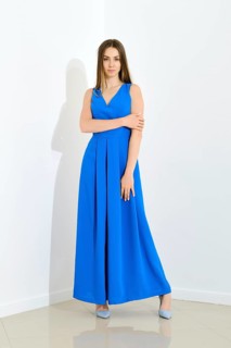 Beautiful woman in long blue dress with low neckline on white background, apparel shoot