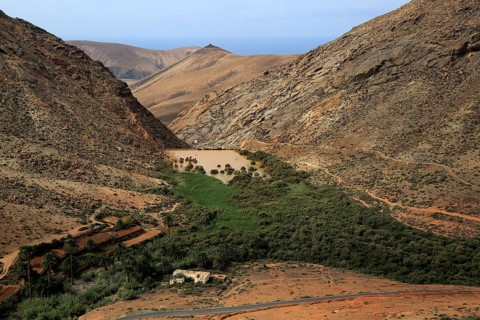Dam and reservoir partially silted up by sediment, Presa de la Penitas, Fuerteventura, Canary