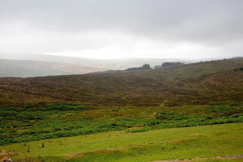 Grey overcast weather clouds hanging over moorland, Dartmoor national park, near Postbridge, Devon,