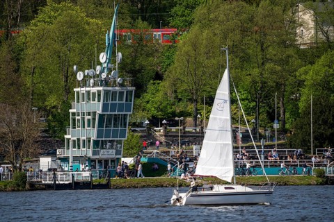 Lake Baldeney in Essen, reservoir of the Ruhr, sailing boat in front of the regatta tower, Essen,