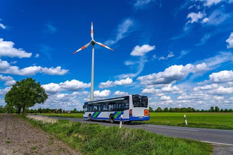 Wind turbine, wind energy plant from the manufacturer Enercon, blue sky with many white clouds,