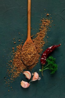 Svan salt, wooden spoon, garlic, red hot pepper, herbs and spices, Georgian cuisine