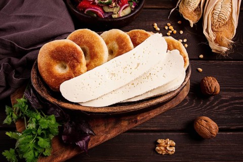 Mchadi, corn tortillas, traditional Georgian dish, corn bread, with Imeretian cheese, homemade, no