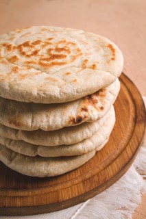 Pita bread, stack, on the table, no people