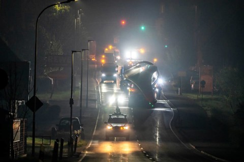 Transport of a 68 metre long, 22 tonne blade of a wind turbine, here in Breckerfeld, with a
