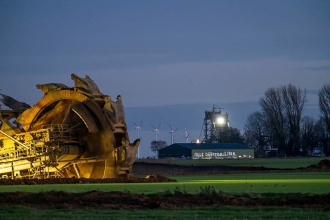 Two excavators are working around the hamlet of Lützerath, occupied by climate activists, the
