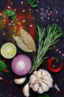 Food background, set of spices and herbs, on a dark background, concept, top view, no people