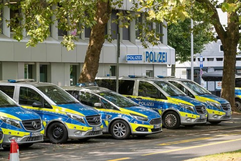 Police station, at Heinrich-Heine-Allee, old town police station, police vehicles, patrol cars, in