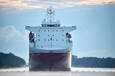 RoRo cargo ship Super Fast Levante travelling through the Kiel Canal at sunrise, Kiel Canal,