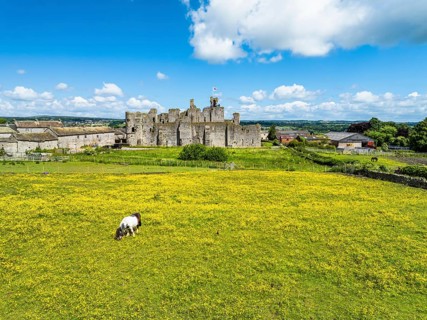 Middleham Castle from a drone, Middleham, Wensleydale, North Yorkshire, England, United Kingdom,