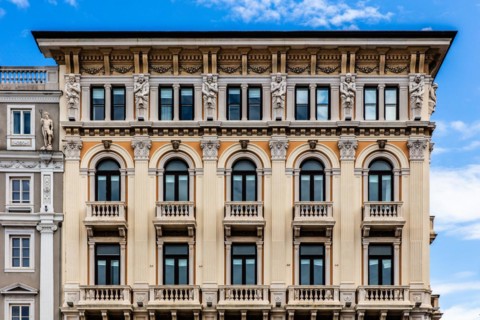 Palazzo Modello, by Giuseppe Bruni, 1873, electic historicism, Piazza Unità d'Italia in the heart