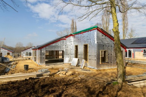Building site single storey bungalow homes, timber frame construction, thermal insulation, Ufford,