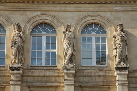 Three sculptures at the opera built in 1862, theatre, house facade with two windows, Toulon, Var,