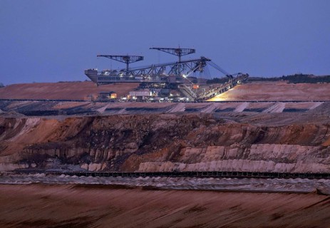 Lignite excavators extract coal in the Welzow open-cast mine, operated by LEAG. The lignite is