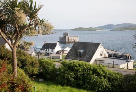 General view of Castlebay the largest settlement in Barra, Outer Hebrides, Scotland, UK looking