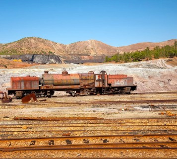 Old rusty abandoned steam train in the Rio Tinto mining area, Minas de Riotinto, Huelva province,