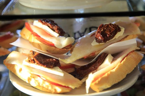 Tapas food display inside famous historic Los Gatos Cervecerias bar, Madrid city centre, Spain,