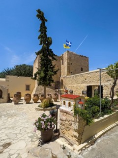 Inner courtyard of Odigitria Monastery In the foreground model of church left in the background