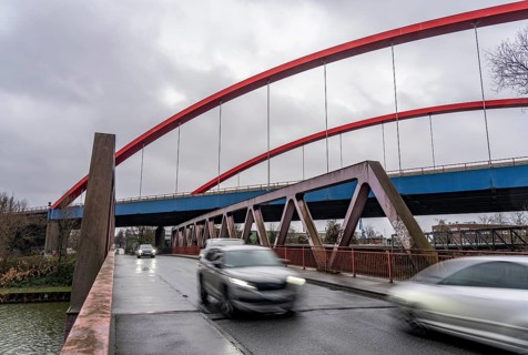 Dilapidated A42 motorway bridge (red arches) over the Rhine-Herne Canal, with massive structural
