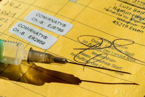 Vaccination booklet, proof of double vaccination with the Corona vaccine from BioNTEch/Pfizer,