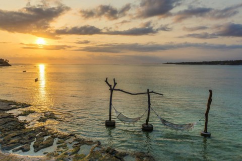 Hammock in the sea water in front of the holiday island Nusa Lembongan, beach, beach holiday, beach
