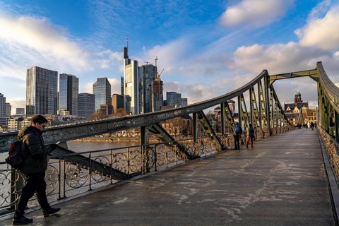 Skyline of the city centre of Frankfurt am Main, river Main, Eiserner Steg bridge, dusk, Hesse,