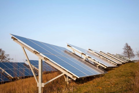 Solar array of photovoltaic panels in countryside at Bromeswell, Suffolk, England, United Kingdom,