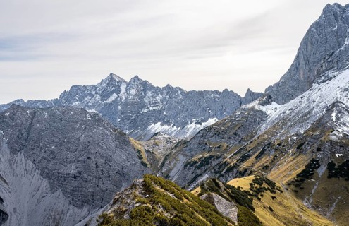 Ridge of Hahnkampl, mountain panorama with rocky steep peaks, view of Hochnissl peak, in autumn,
