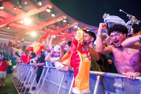 Spanish fans celebrate after scoring the 2:1 goal at the Adidas fan zone at the Bundestag during