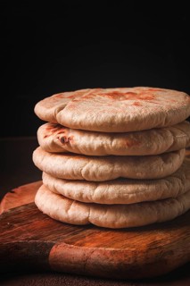 Pita bread, stack, on the table, no people