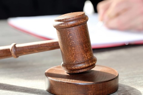 Close-up of a judge's gavel as a symbolic image for a court judgement