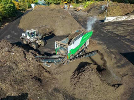 Composting plant, organic waste is composted, sorted by size, smaller parts are reused as compost,