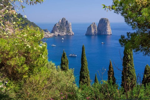 South coast with the Faraglioni rocks, the island's landmarks, Capri, Campanian Archipelago, Gulf