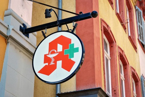 Heidelberg, Germany, July 28th 2024: Logo of German Pharmacy Association hanging from building,