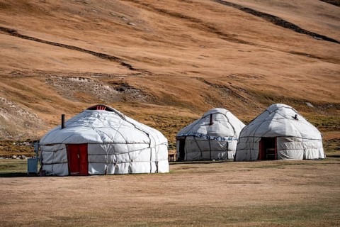 Yurts with yellow hills, Atbashy district in the Naryn region, Kyrgyzstan, Asia