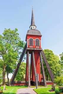 Wooden belfry at Habo Church with a churchyard on the swedish countryside, Habo, Sweden, Europe