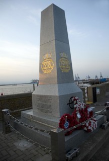 Merchant Navy memorial with wreaths, Harwich, Essex, England, UK