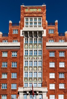 Art Deco building Palazzo Aedes or Palazzo Rosso, waterfront promenade, Trieste, harbour town on