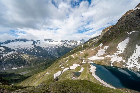 Picturesque mountain landscape with blue mountain lake, Schwarzsee, glacier Hornkees and Waxeggkees