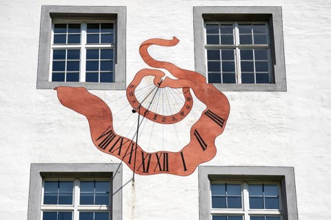 Facade with an artistically painted sundial with Roman numerals, numbers, Salem Castle, former