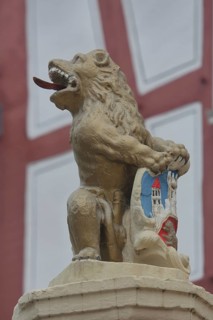 Market fountain with lion figure and town coat of arms, Oberer Markt, Biedenkopf, Hesse, Germany,
